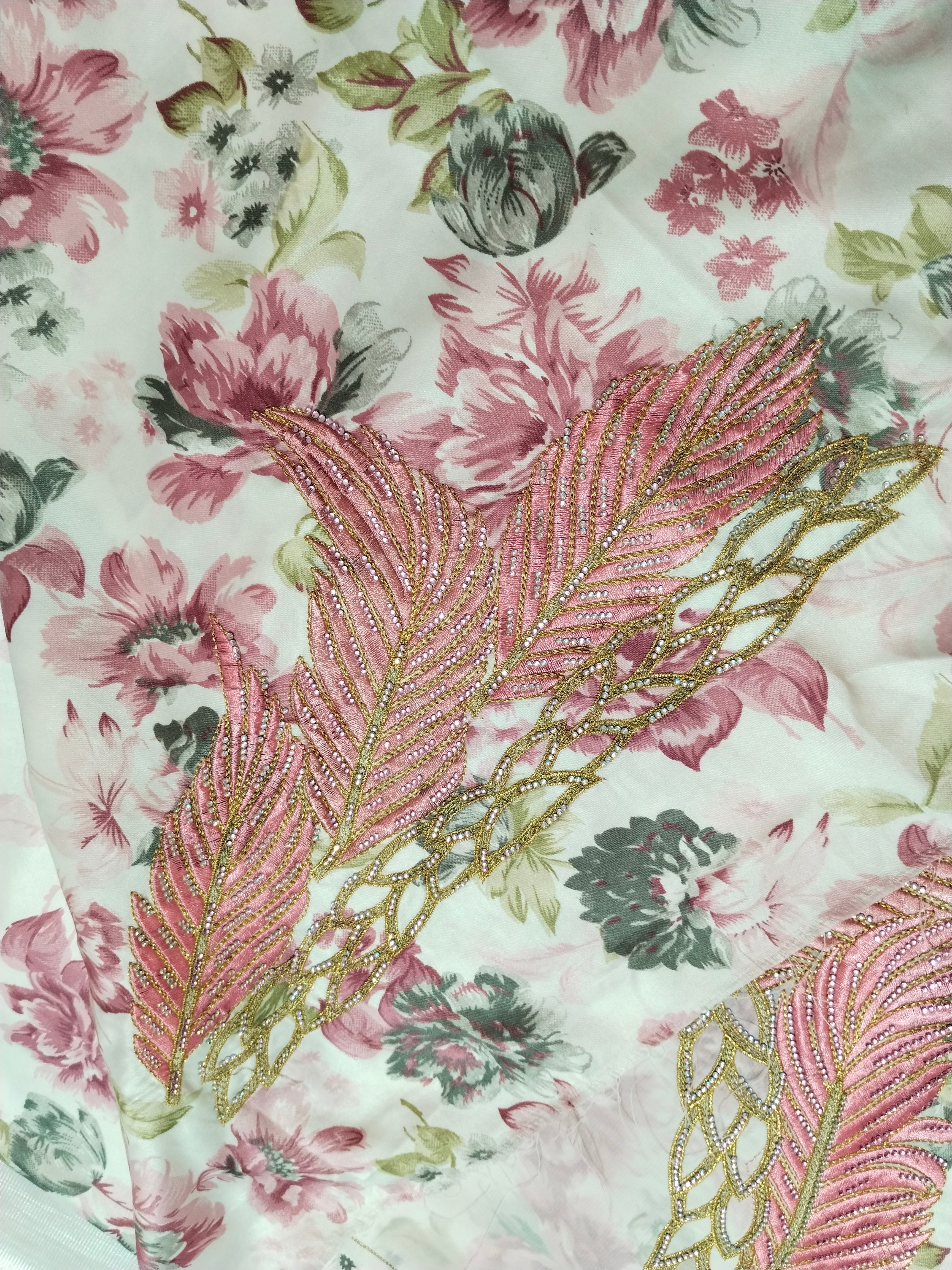 Floral fabric with pink and gold feather design