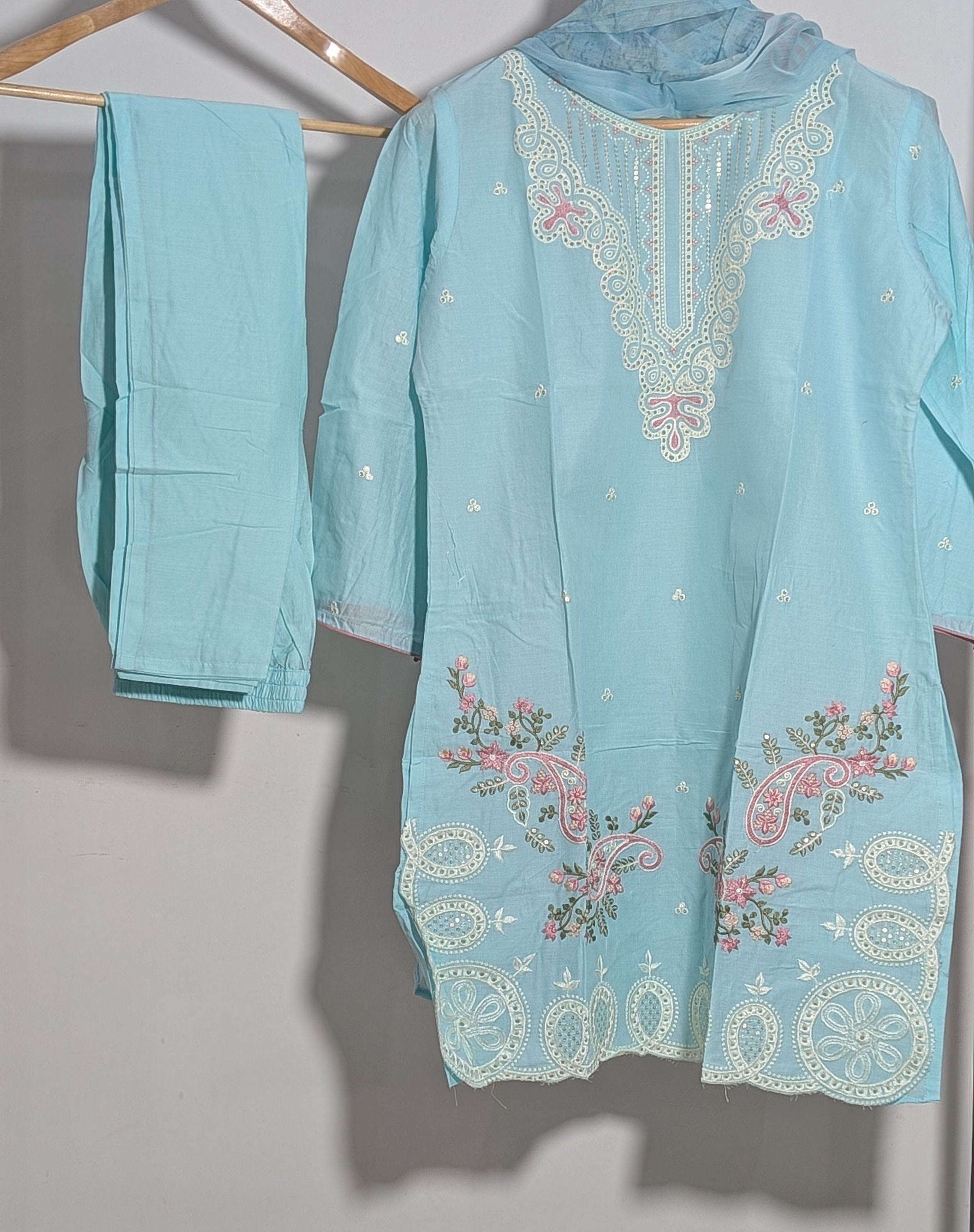 Light blue embroidered traditional outfit with a matching dupatta on a white background